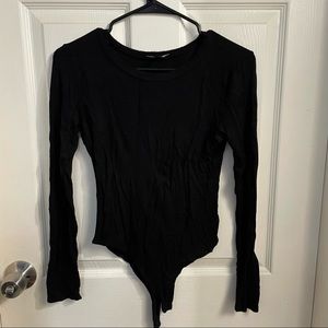 Woman’s size medium long sleeve bodysuit